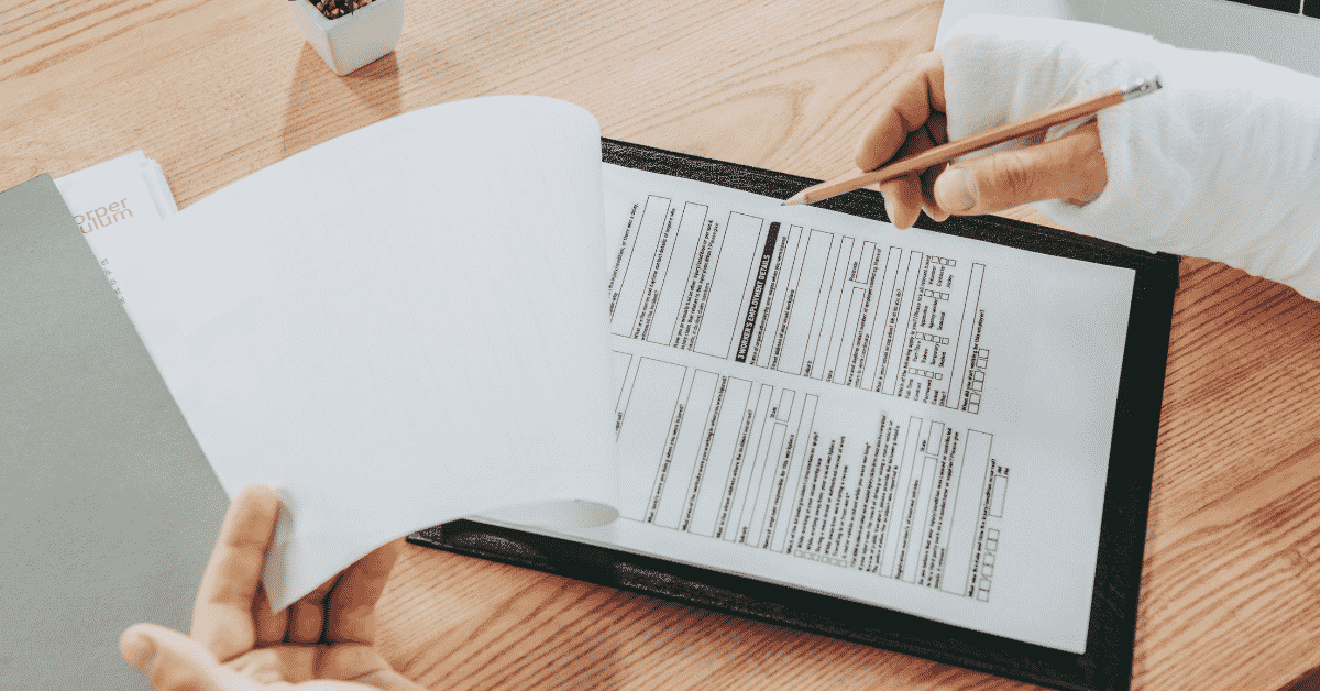Filling workers compensation claim papers with broken hand