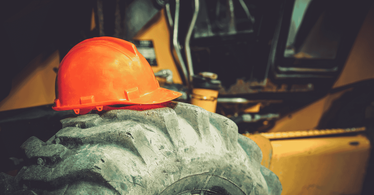 What If I Was Injured On The Job By Defective Machinery? 1 Construction safety helmet sitting on top of machinery