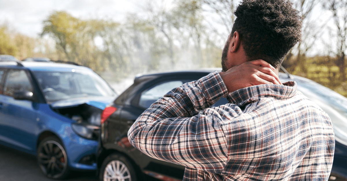 Car passenger getting out of the car with neck pain from the car accident