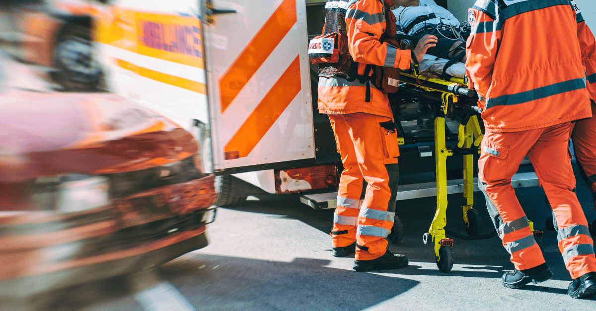 What Are My Recovery Options If The Negligent Driver Died? 1 Paramedics pushing stretchers with injured person in car accident inside ambulance vehicle